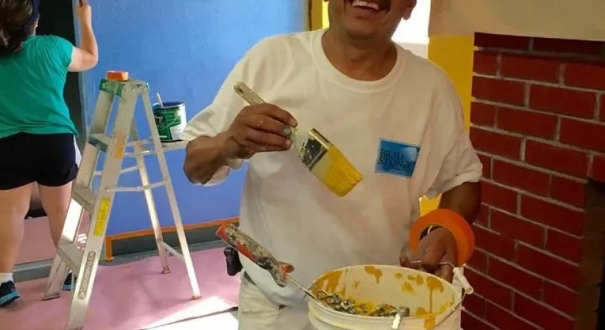 Man Paint the Wall Happily